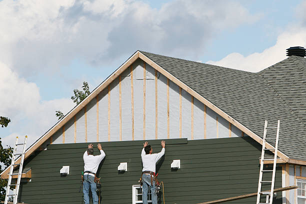 Professional Siding Installation technician working in Wenham, MA